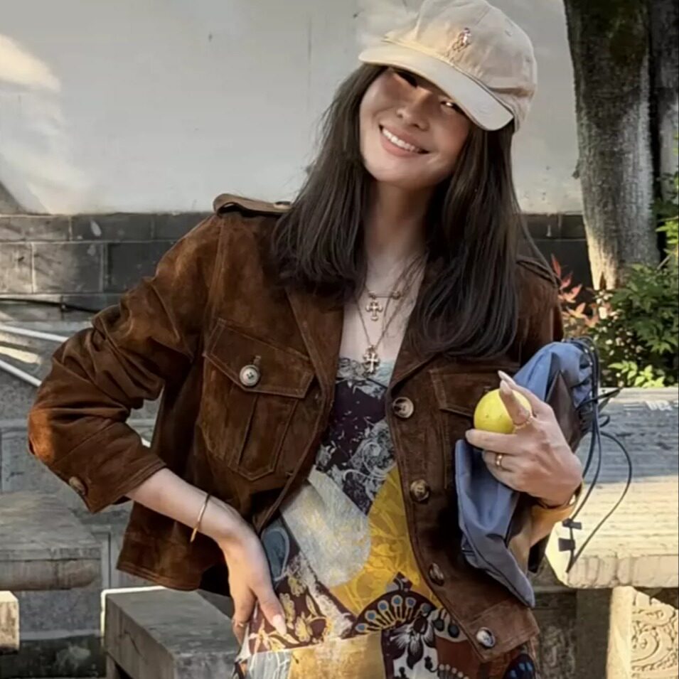 咖啡色翻毛短款宽松立领皮衣女