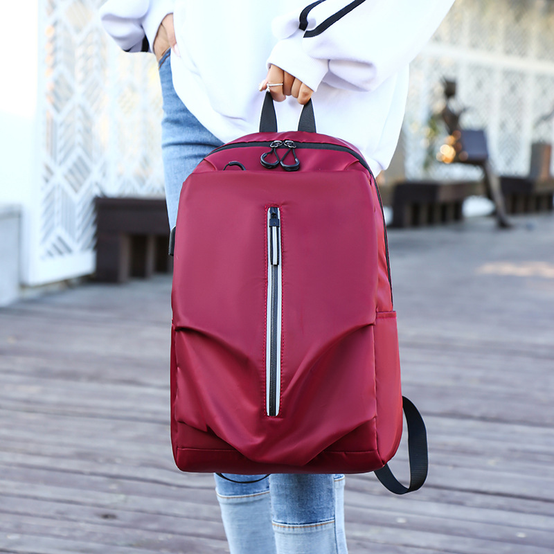 跨境新款涤纶学生书包女韩版校园学生双肩包简约男背包旅行