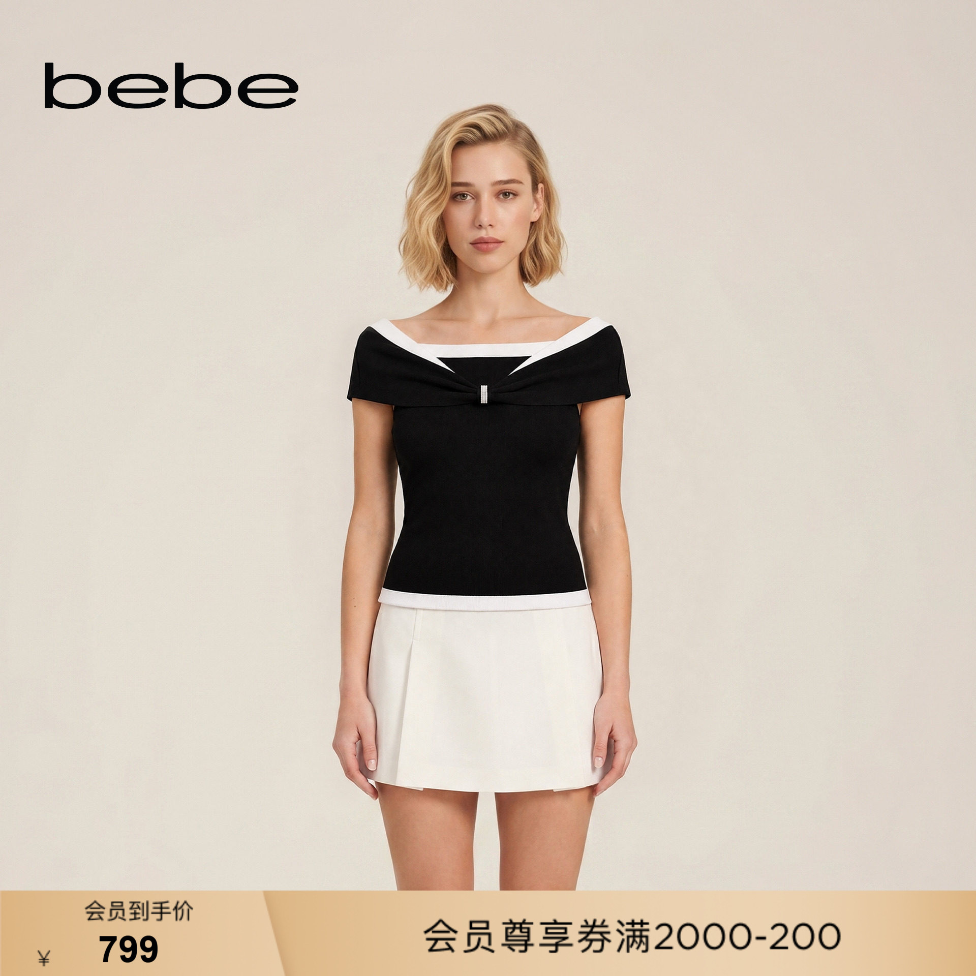 bebe2026秋季新款女士气质小香风黑白撞色一字领针织上衣330401图片