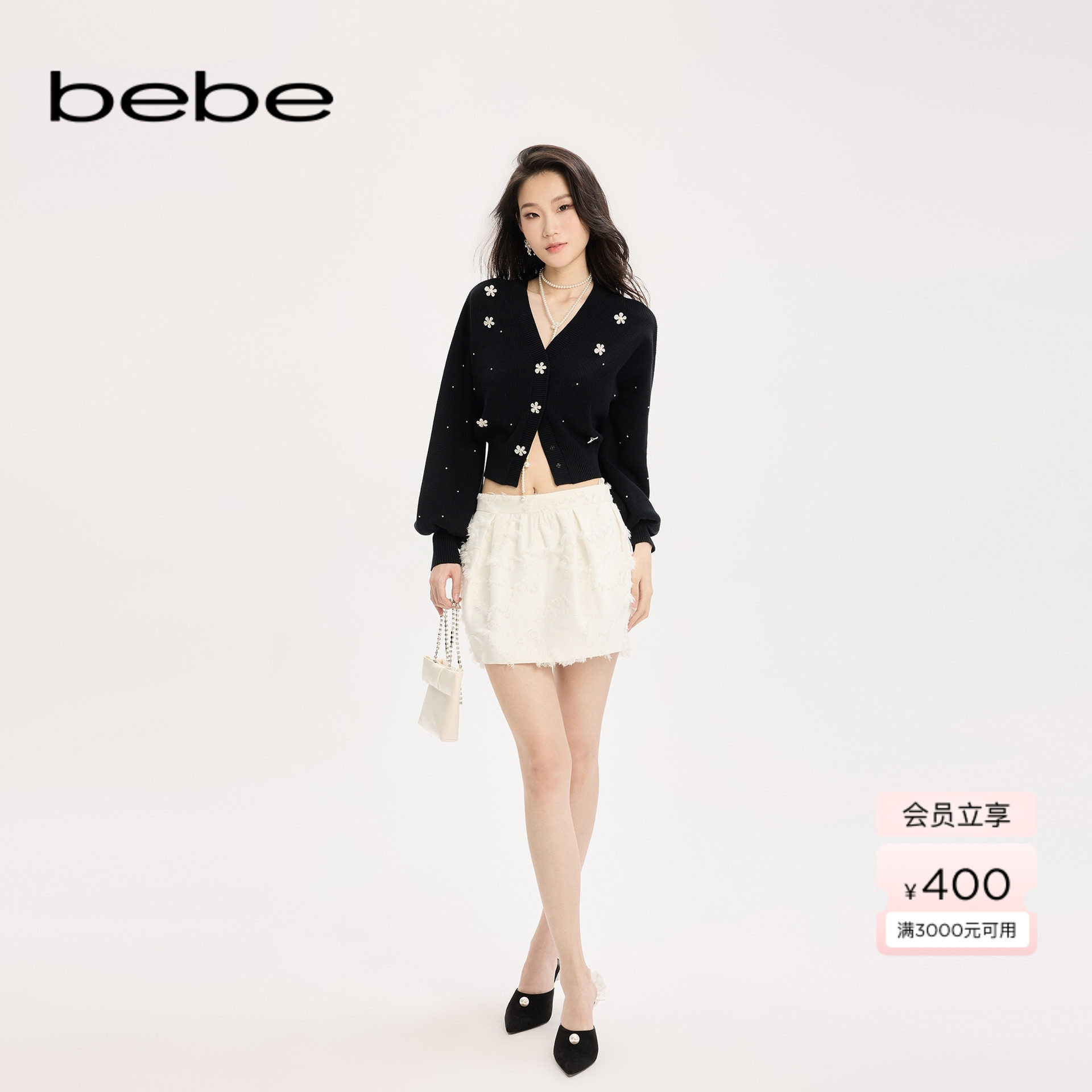 bebe2025秋季新款女士白色高腰显瘦提花设计小香风花苞短裙320202