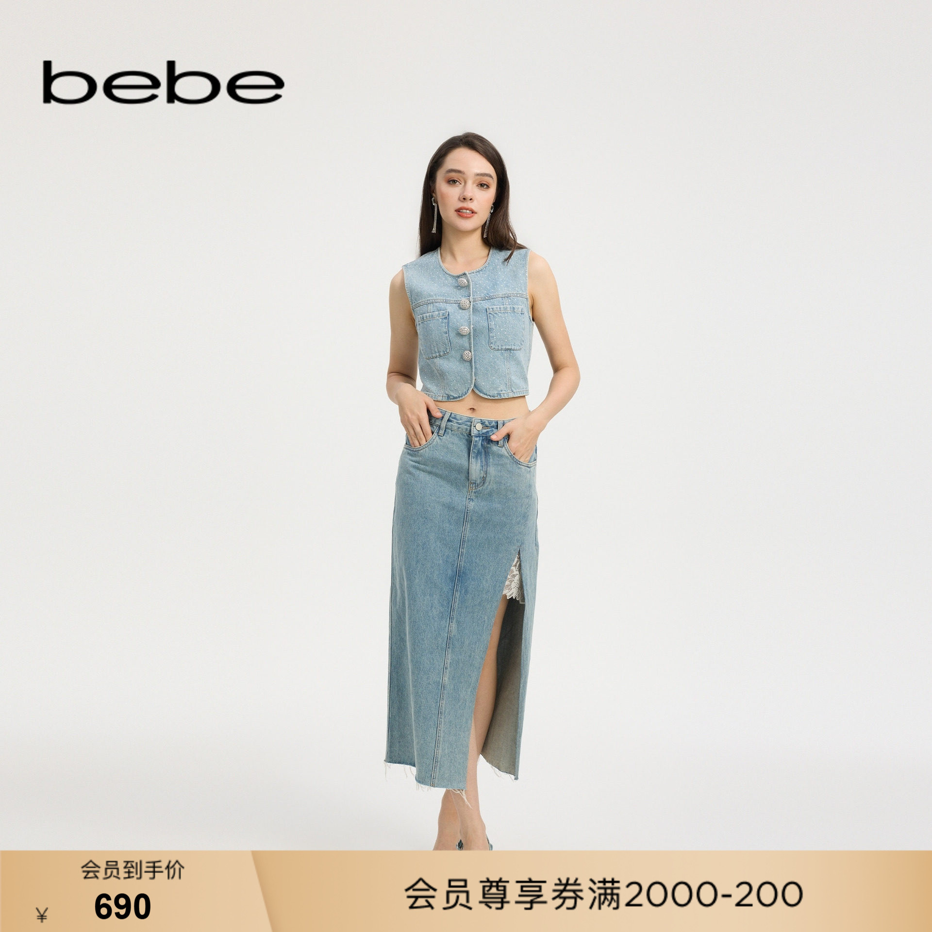 bebe春夏女士日常通勤风含棉蕾丝拼接开衩牛仔半身裙220116