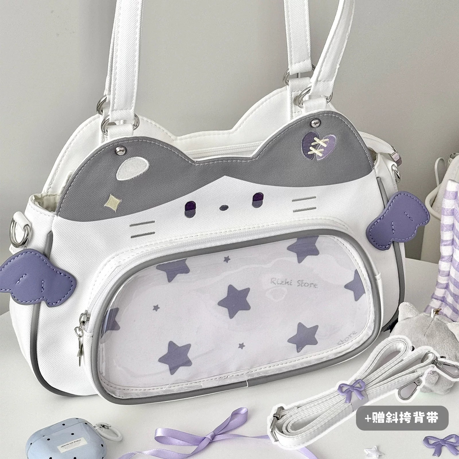 2025新款猫咪痛包小食量娃包尼龙斜挎包可爱学生电脑包