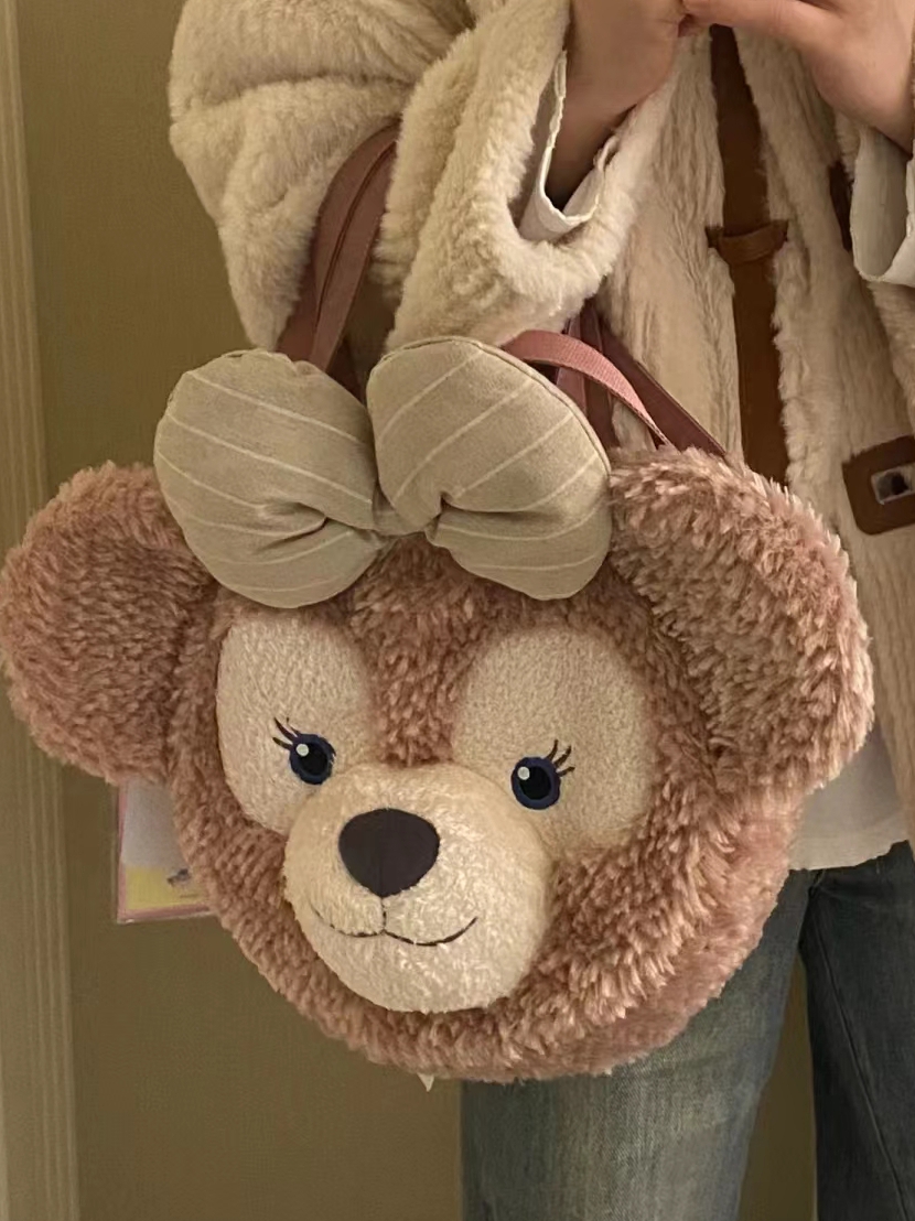 国内迪士尼代购达菲雪莉玫大脸包 可斜挎双肩背毛绒背包超大容量