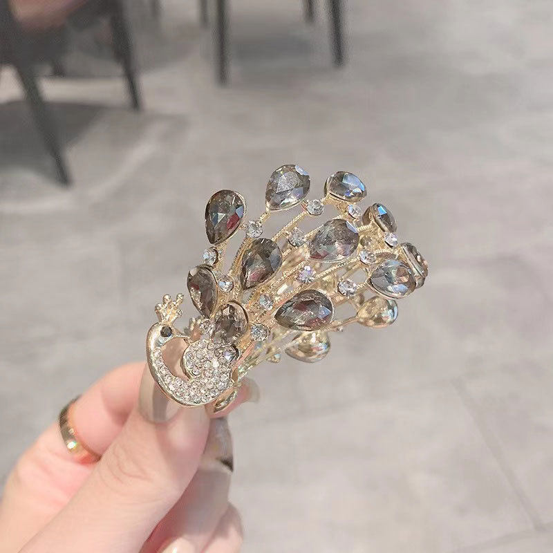 撤柜高级感高马尾固定神器发夹孔雀水晶抓夹夏季夹子头饰发卡