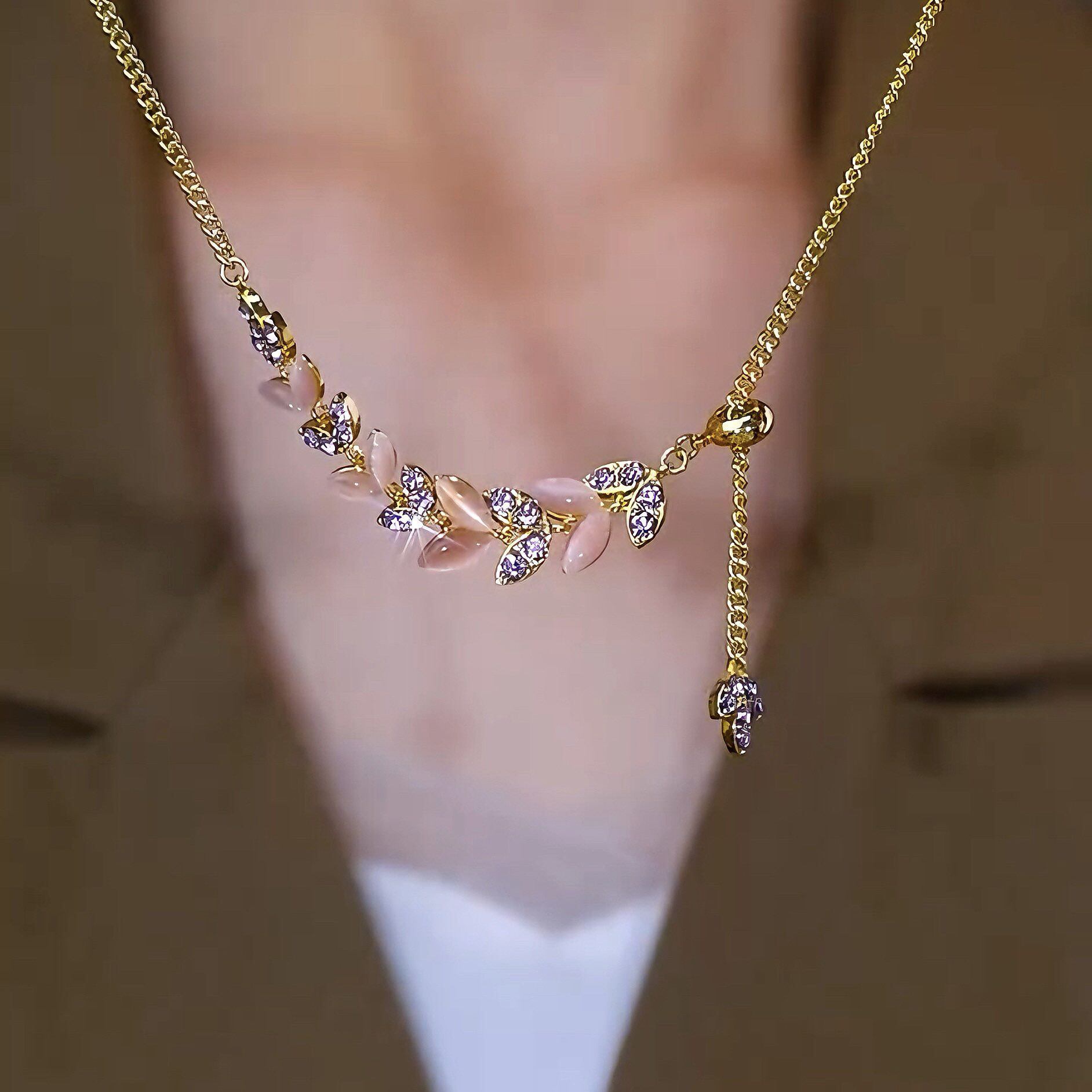 撤柜高级感镶钻紫色猫眼石项链女轻奢气质奢华高档锁骨链大气毛衣