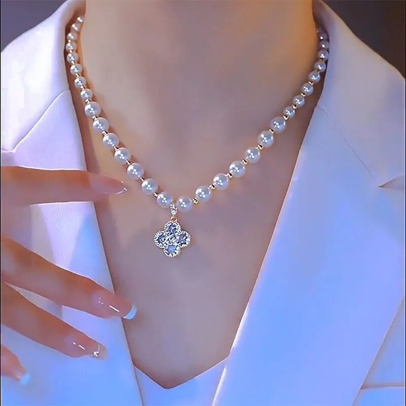 撤柜玻璃珍珠项链气质渐变女王奢华小众女款四叶花锁骨钻石项链爆