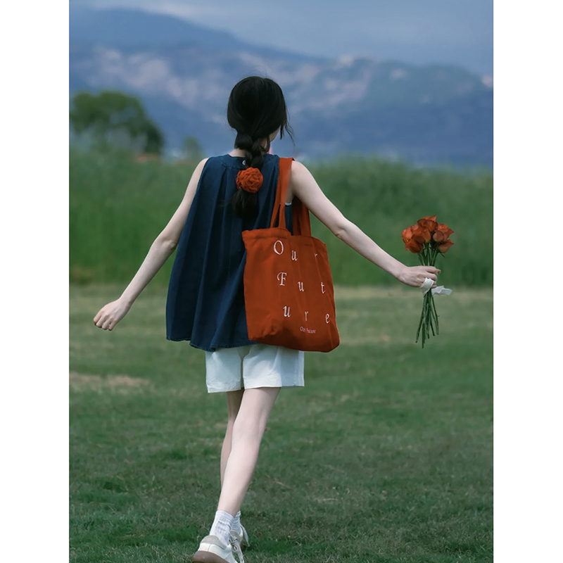 法式甜辣蓝色牛仔挂脖吊带背心女夏季外穿宽松娃娃衫露肩无袖上衣