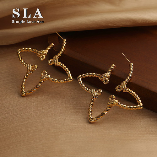 【新品八折】  镂空四叶草设计师款冷淡风银针耳环气质女潮