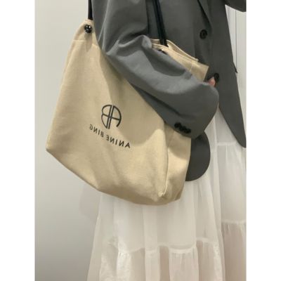 慵懒风大容量托特包男女同款夏日ins休闲百搭通勤单肩手提帆布包