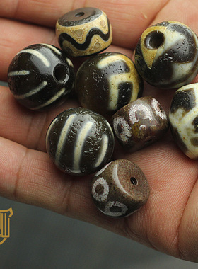 达洛虎牙糖球天珠三眼至纯包浆