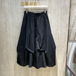 2026秋季新款松紧腰不规则褶皱半身裙女设计感中长款蓬蓬灯笼裙潮