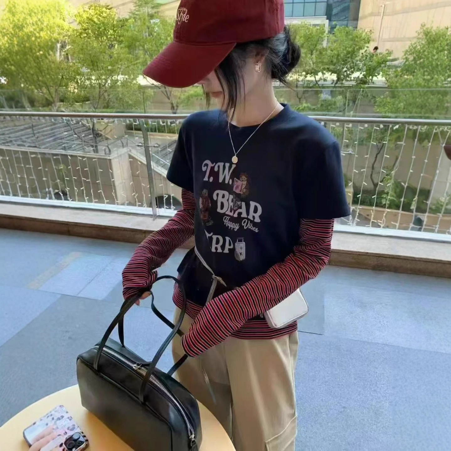 广州十三行2025早秋新款修身打底衫上衣 撞色条纹拼接假两件T恤女