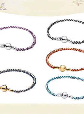 The popular  silver wristband features dual tone and woven C
