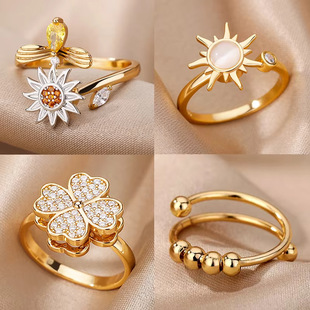 Rotating full diamond gold-plated ring relieves anxiety