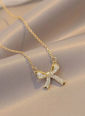 Exquisite Copper Inlaid Zirconia Bow Pendant Necklace for Wo