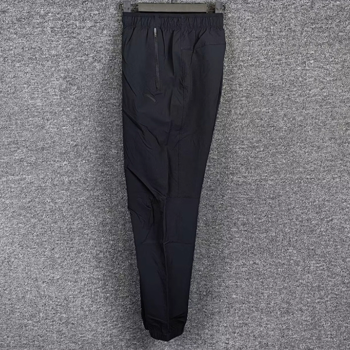 安踏正品男裤2025春新款综训时尚收口休闲梭织运动长裤152517513