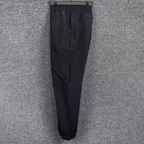 安踏正品男裤2025春新款综训时尚收口休闲梭织运动长裤152517513