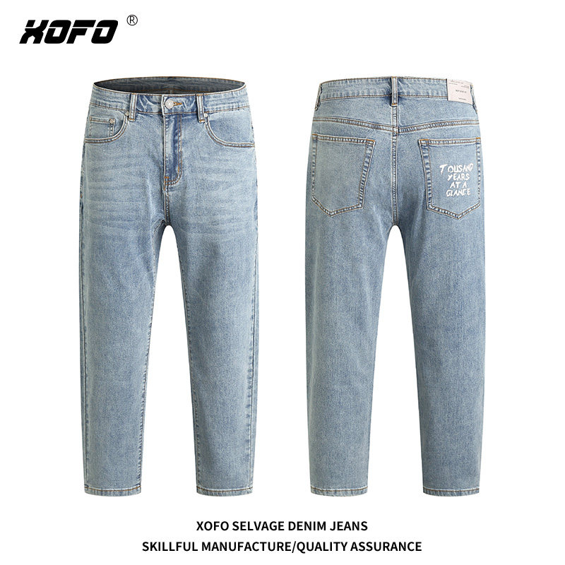 男士复古水洗牛仔裤九分小脚宽松潮流修身浅蓝色休闲字母设计高端
