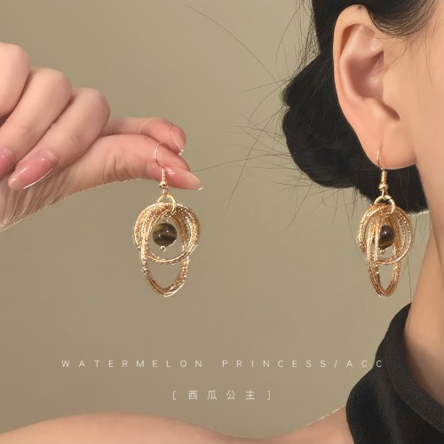 「文艺少女」独特漂亮耳环2026新款爆款高级感金色虎眼石耳饰女