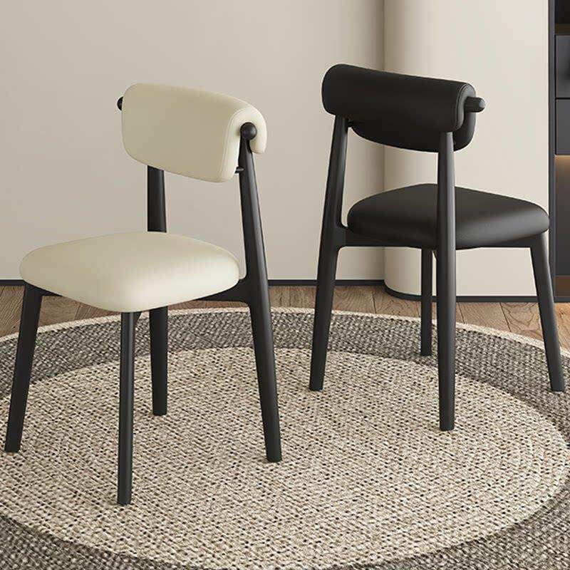 意式极简实木餐椅家用轻奢高级感餐桌椅子黑色真皮靠背椅2025新款
