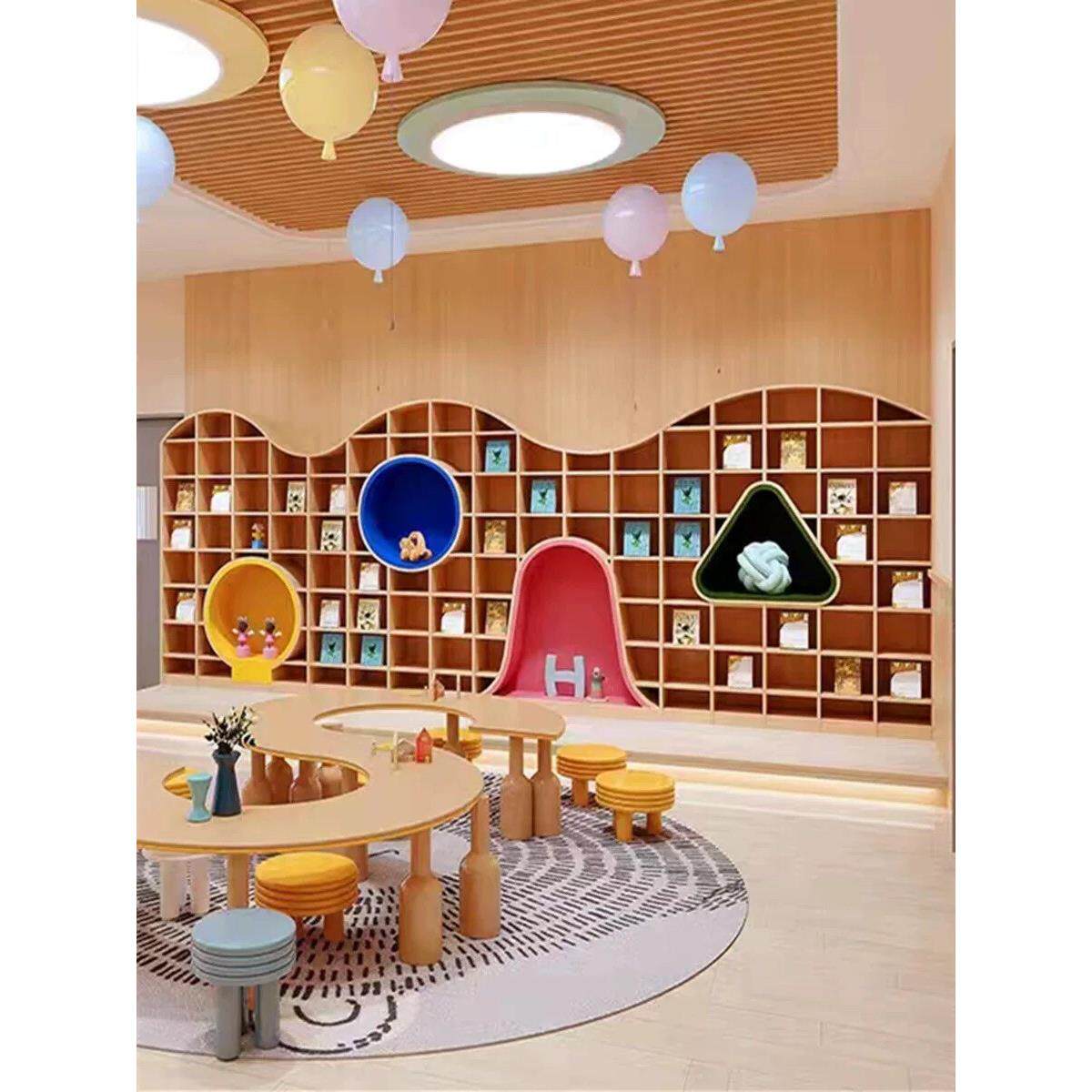 定制幼儿园书店主题环创墙面异形书柜展示儿童书吧培训波浪顶文化