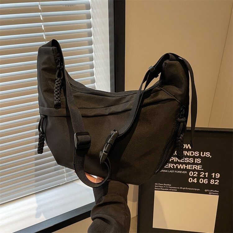 饺子包女斜挎包2025新款帆布包韩系慵懒风上班通勤单肩包