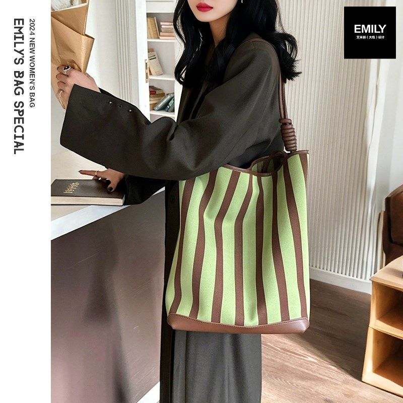 新款真皮弹性帆布女包撞色条纹绳结大容量复古通勤水桶包手提单肩,箱包皮具/热销女包/男包,水桶包,淘宝优惠券,粉丝福利购,淘宝优惠卷