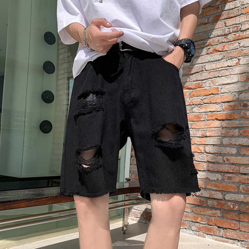 美式复古黑色破洞牛仔短裤男夏季潮牌高街五分裤毛边设计六分裤子