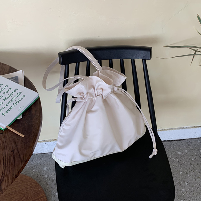 日系简约休闲抽绳单肩包女韩版文艺包包I大容量百搭纯色女包水桶