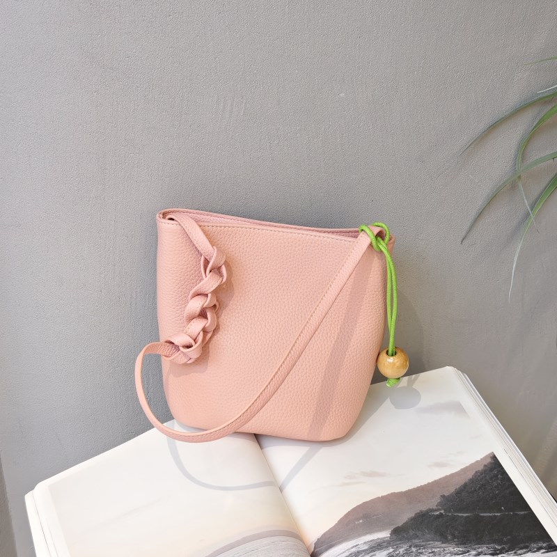 头层牛皮荔枝纹极简风水桶包包女2025春季新款休闲时尚单肩斜挎包