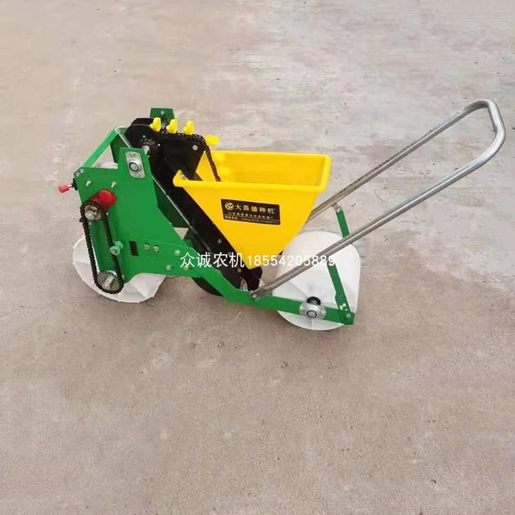 手推1行2行大蒜播种机电动种蒜机出售家用大蒜桃核山药豆播种