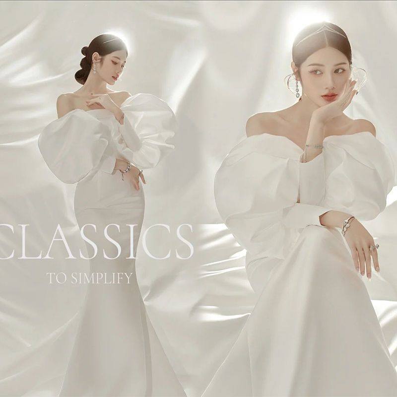 新款影楼内景简约拍照修身鱼尾抹胸礼服高定缎面泡泡袖主题服装