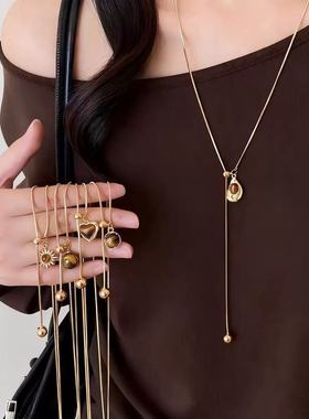 美拉德金色虎眼石吊坠项链女款高级感轻奢小众秋冬长款毛衣链配饰