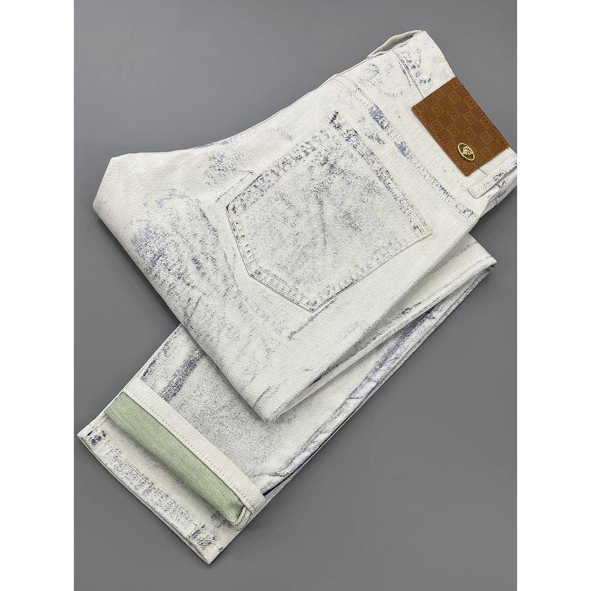 设计感白色刮烂牛仔裤男士2025新款彩绘涂鸦潮流个性修身小脚裤子