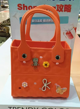 卡迪娜专柜正品橡塑女包洞洞包橙色DIY装饰扣