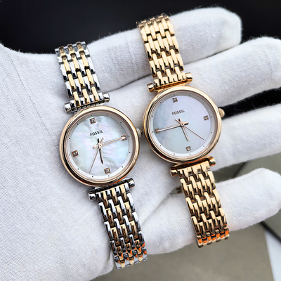 FOSSIL简约秀气贝母面女表
