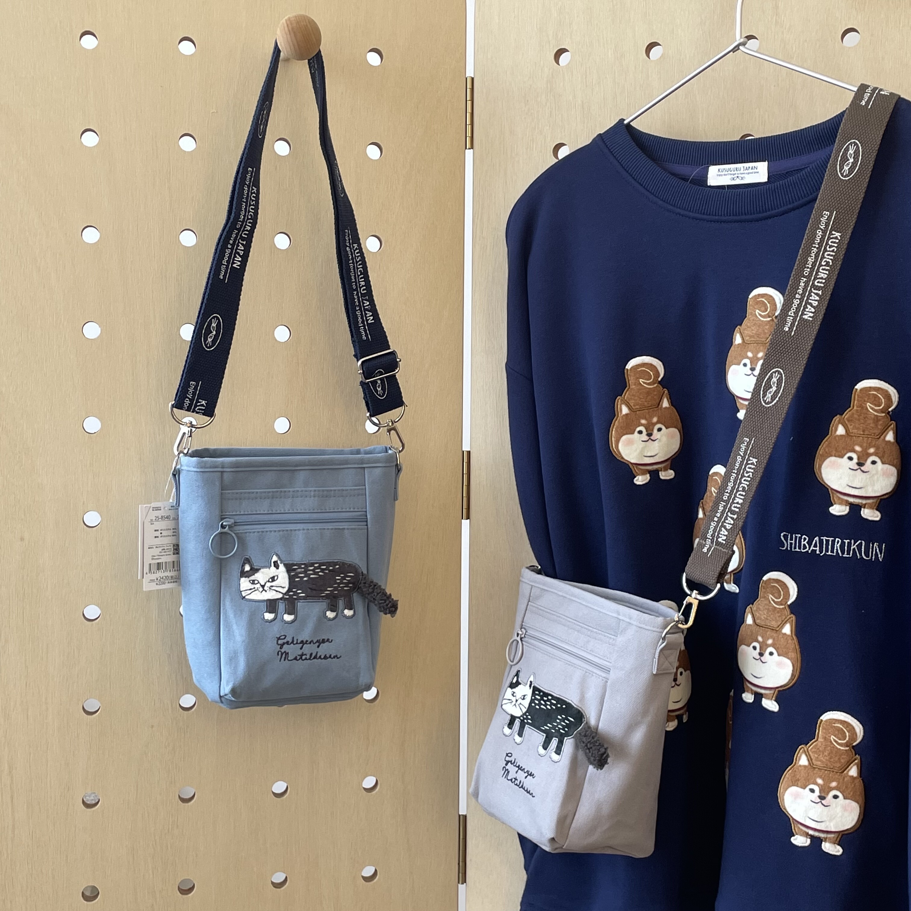 kusuguru多口袋斜挎小水桶包