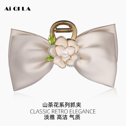 AIQILA蝴蝶结布艺法式山茶花抓夹