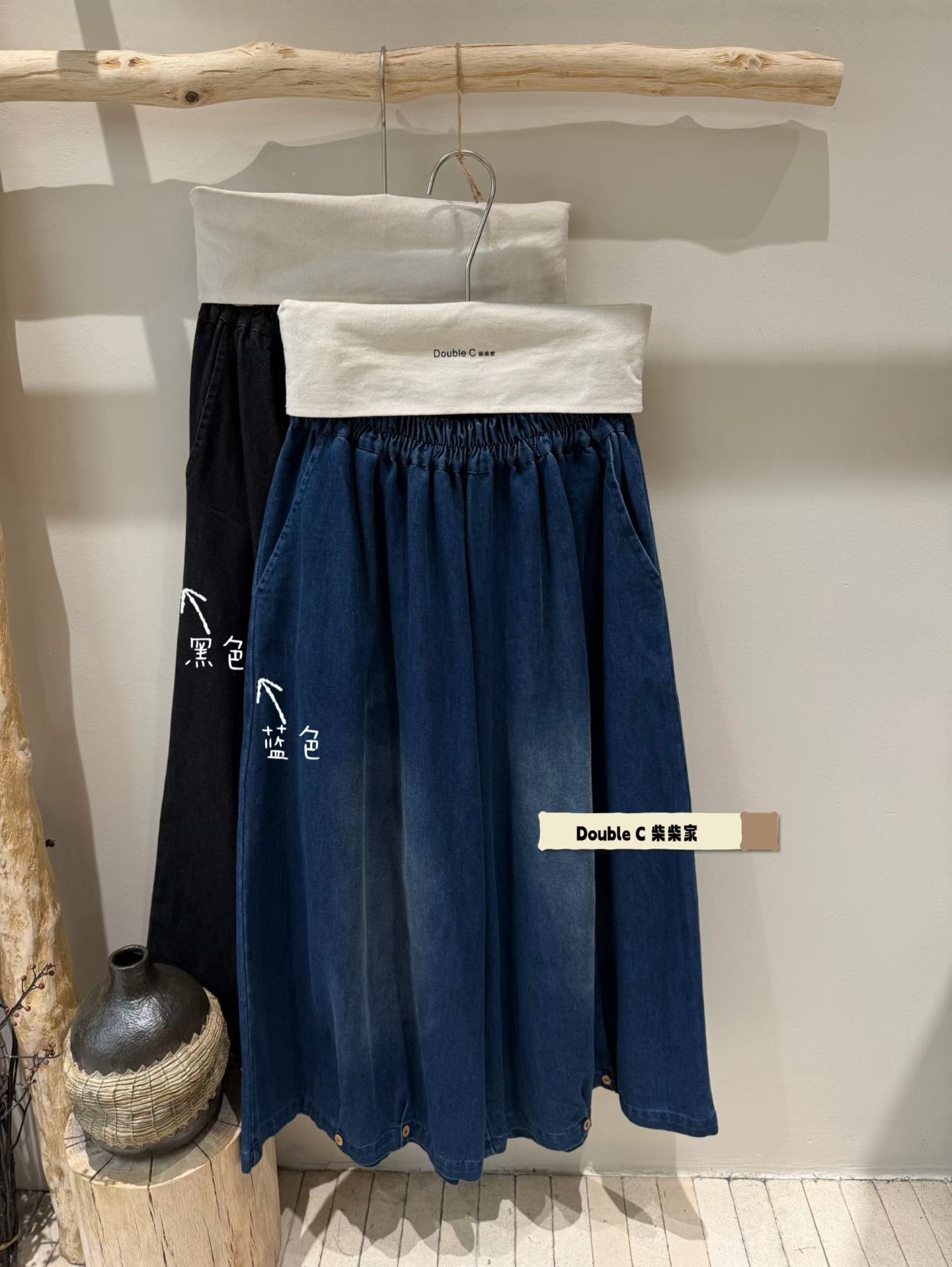 新款复古裤脚扣子牛仔裤女