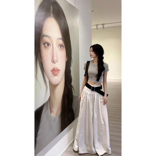 白色半身长裙轻奢高级感垂感女夏季2026新款褶皱高腰A字大摆伞裙
