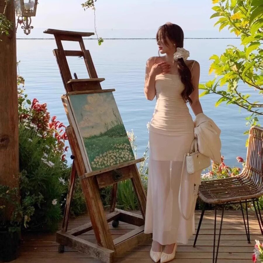 甜美风碎花褶皱网纱吊带连衣裙女2025夏季设计感收腰显瘦鱼尾长裙