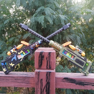 M2重机老干妈振动旋转闪光八音抢男孩透明齿轮电动玩具枪儿童礼物