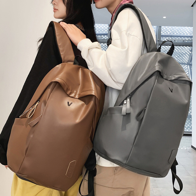 牧司休闲大容量防水双肩包男女