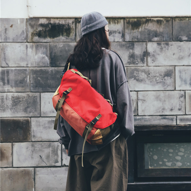 情侣斜挎包男休闲邮差包时尚潮单肩包大学生运动旅行背包女士布包