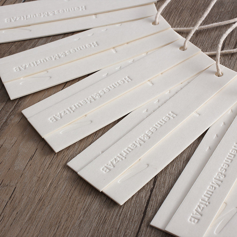 名赫  烫白压痕纸质服装吊牌档特定制定做高种纸韩国个性内衣儿童高端