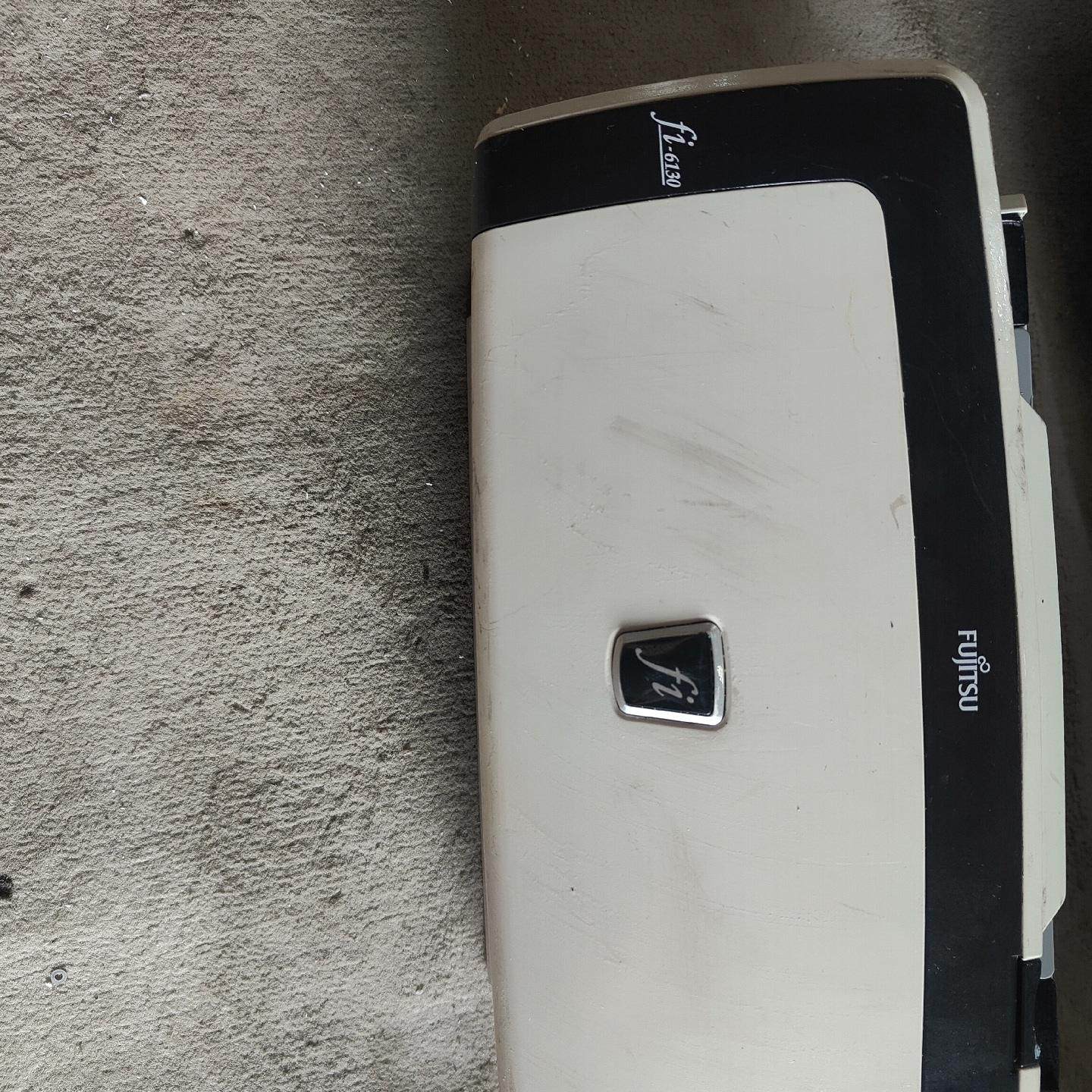 通fi6130扫描仪是一款高效的全自动双面彩色影像扫描仪