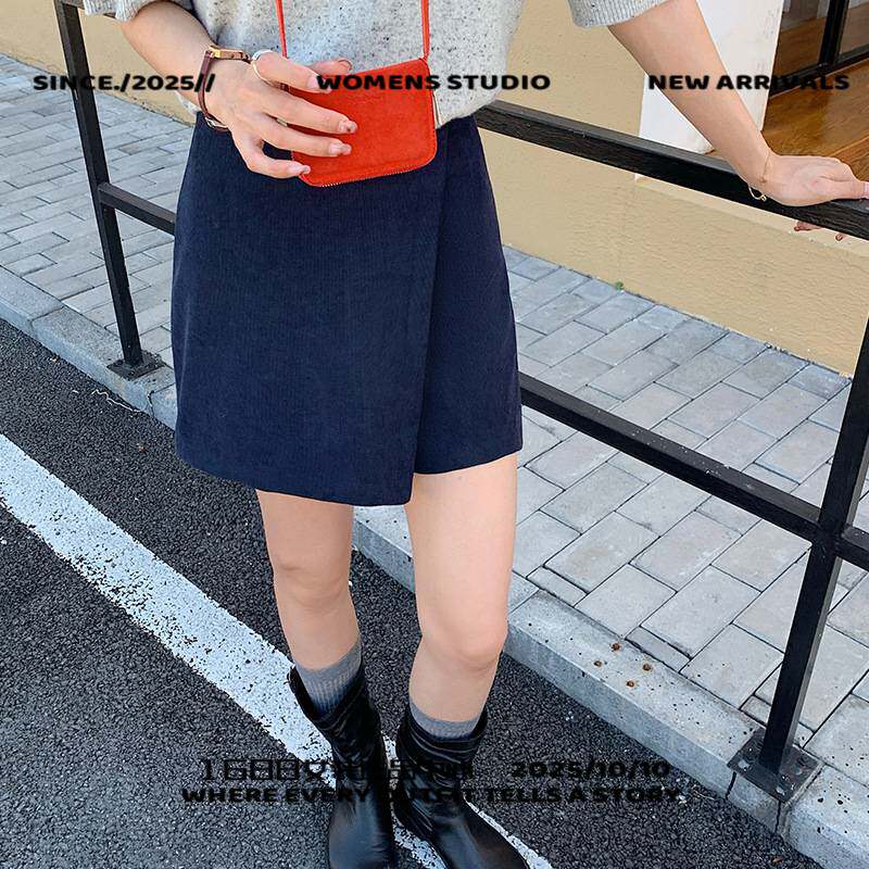 广州市偏爱服饰不规则字半身裙辣妹短裙女秋冬裙裤黑色开叉显瘦灯