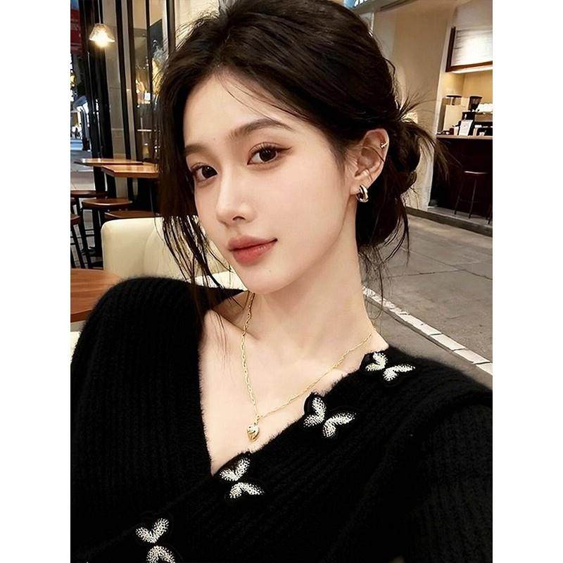 新品春秋装赫本风黑色V领针织衫女蝴蝶毛衣ins不规则短款上衣