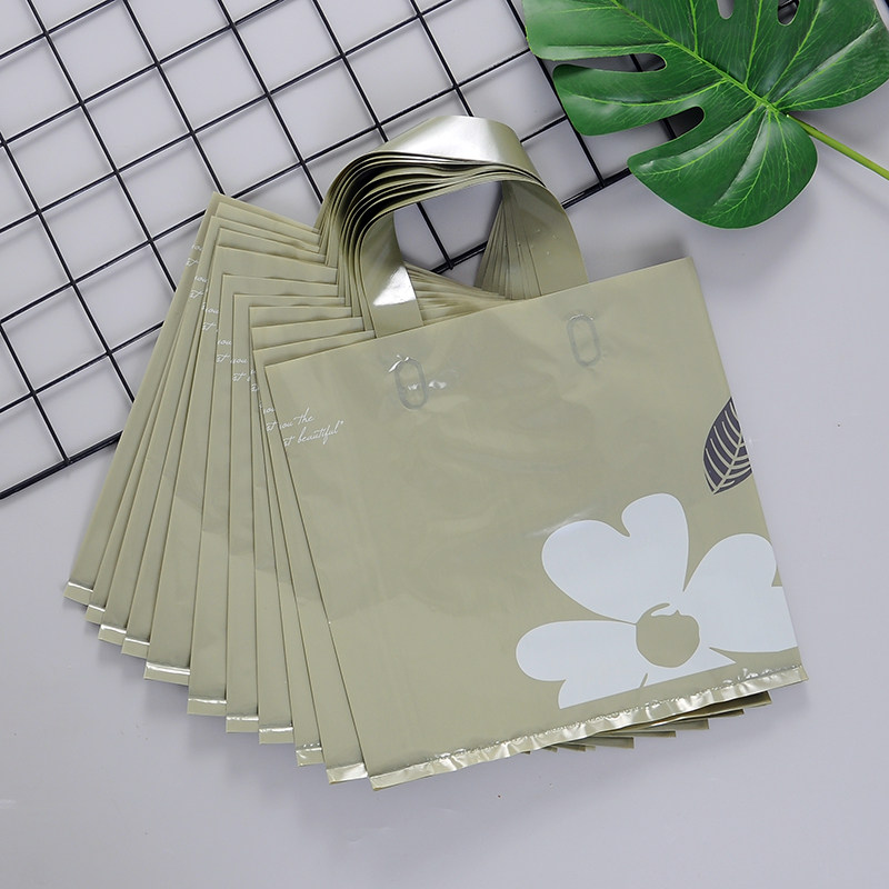 新款山茶花手提袋塑料袋手拎服装袋橄榄绿购物袋包装袋子定做LOGO