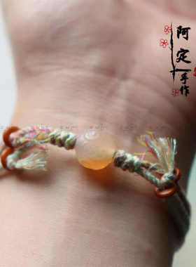 藏式手搓棉线手绳糖心玛瑙转运珠